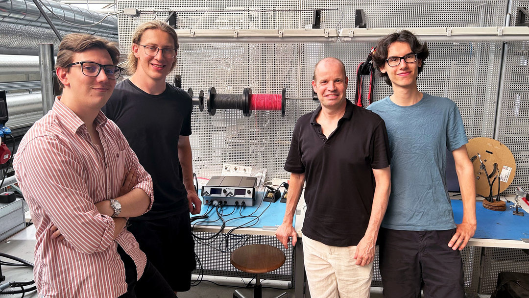 Members of the HERMES team (from left): Pablo Scherpereel (HERMES Project Manager), Lennard Voigt (HERMES Avionics Team Lead), Reto Leuenberger, Managing Director of Intec AG, Carl Ceccucci (HERMES Avionics Team Member) with the Ersa i-CON VARIO 4 soldering & desoldering station