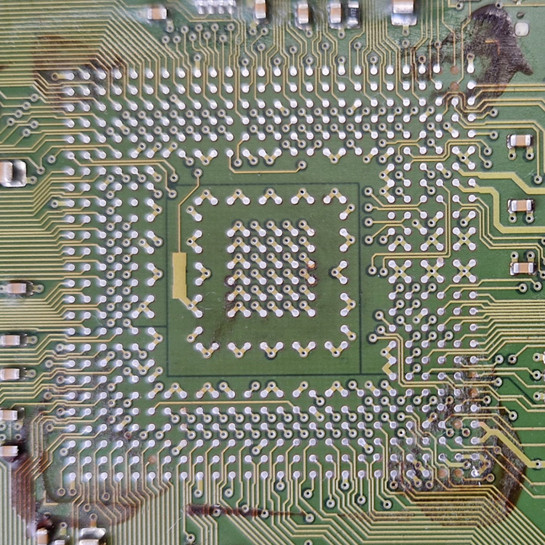 Enlarged section of the assembly with the cleaned landing surface of the BGA