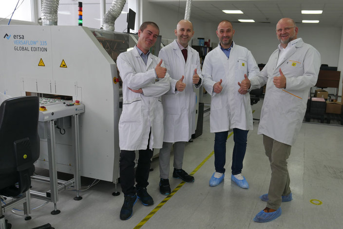 Process Manager Plamen Enchev (left) and COO Valentin Zhelyazkov, 2nd from left, here with Ersa Area Sales Manager Christian Ott (right) and Nikolay Momchilov (2nd from right), Managing Director ERSA-Bulgaria) are delighted with the smooth production of the VERSAFLOW 3/35, which doubled output at Phonotronica