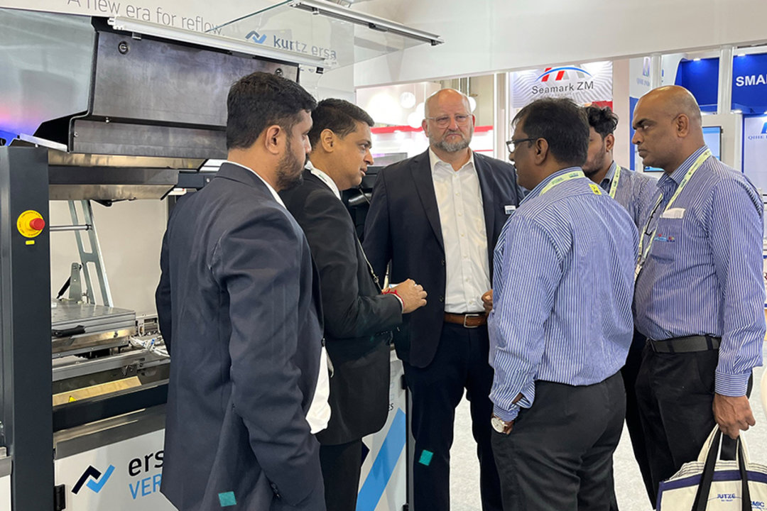 Intensive discussions at Productronica & Electronica India - here in front of the Ersa reflow soldering system HOTFLOW THREE