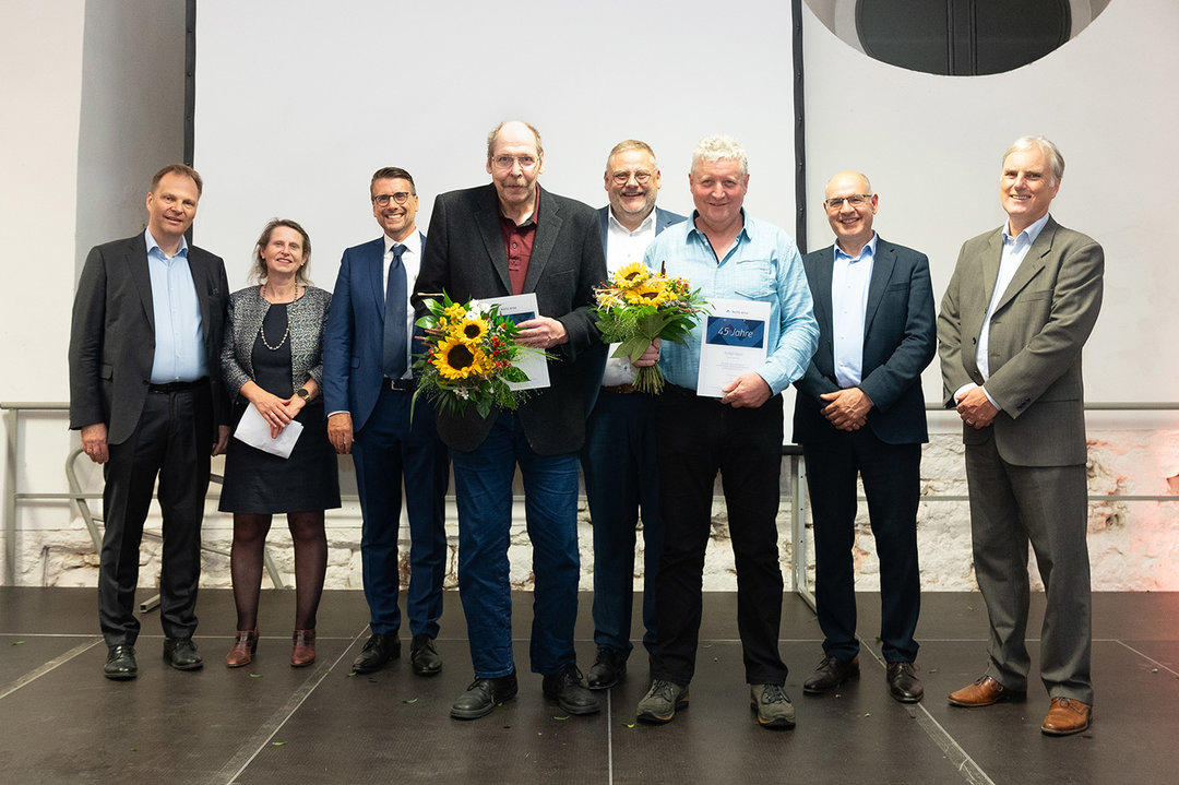 45 years with the company (from left): Dr. Michael Fischer, Dr. Astrid Rota, Massimo de Vivo, Andreas Dressler, Thomas Mühleck, Rudolf Albert, Andrea Carta, Hubert Baren