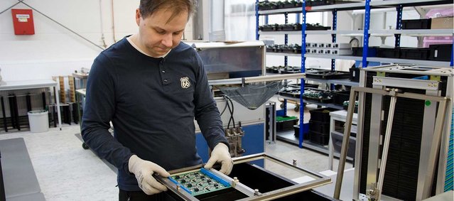 Assembly is clamped in a soldering frame