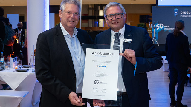 Ersa Head of Sales Rainer Krauss (r.) and Chairman of the Advisory Board of Kurtz Ersa, Rainer Kurtz, are delighted with the Productronica award presented to Ersa GmbH, which has been delivering innovations for electronics producction since 1975 Ersa Head of Sales Rainer Krauss (right) and Chairman of the Advisory Board of the Kurtz Ersa Group, Rainer Kurtz, are delighted with the Productronica award presented to Ersa GmbH, which has been continuously delivering innovations for electronics production since the trade fair was founded in 1975